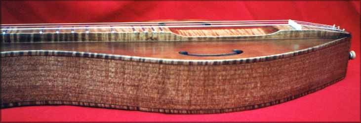 Curly Maple binding and fingerboard